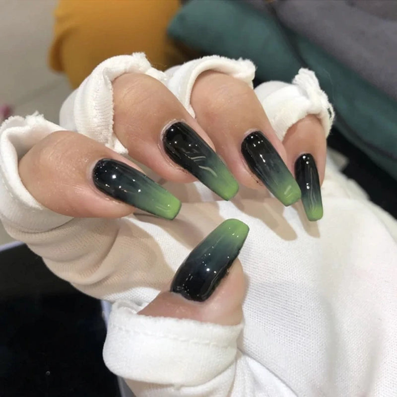 black and green artificial acrylic nails