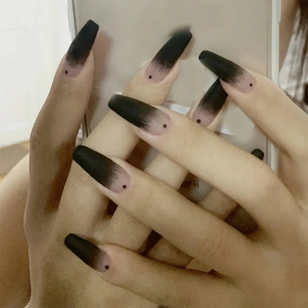 black and nude artificial acrylic nails