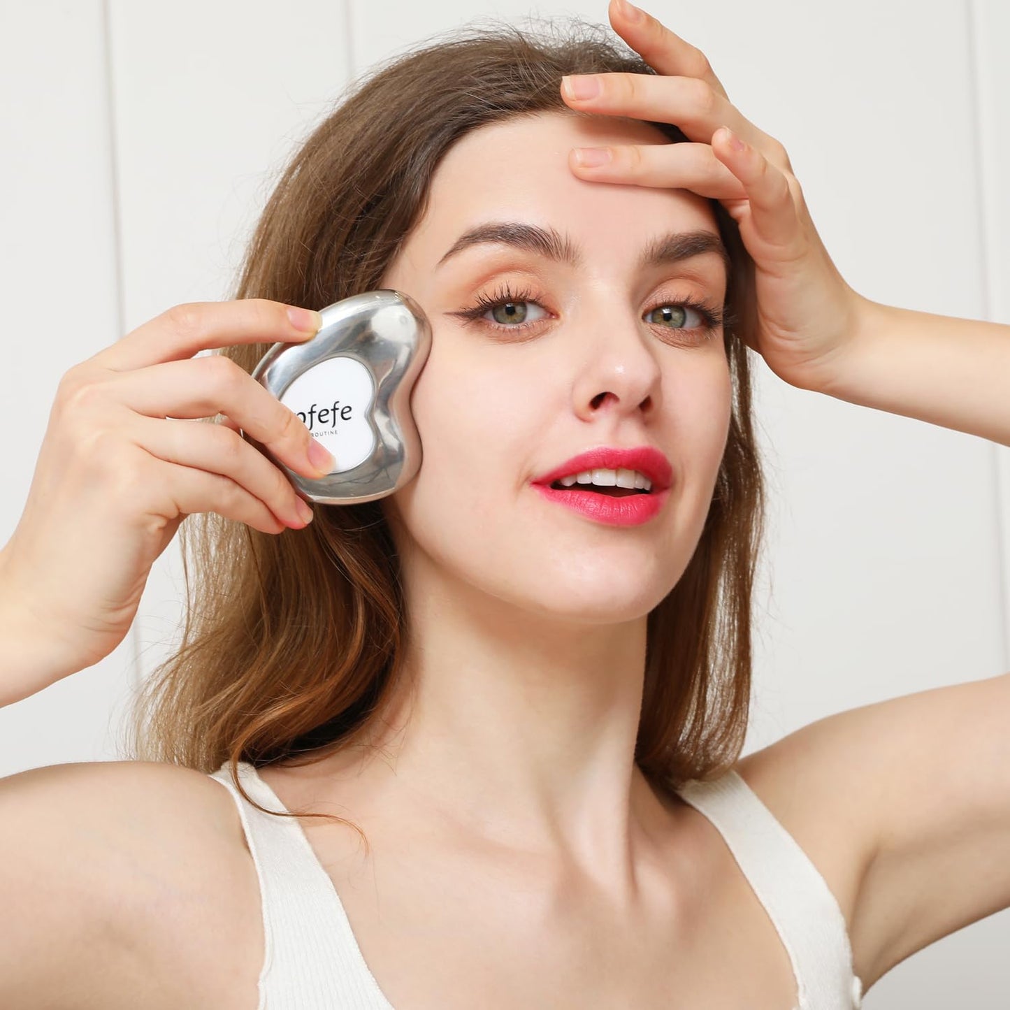 Lady Using Stainless Steel Cryo Gua Sha